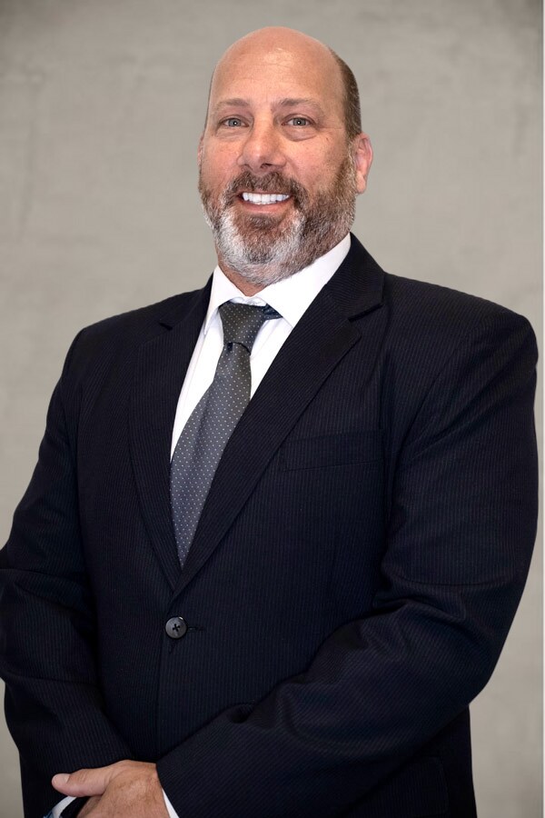 Christopher Goodroe, Esq. - Partner