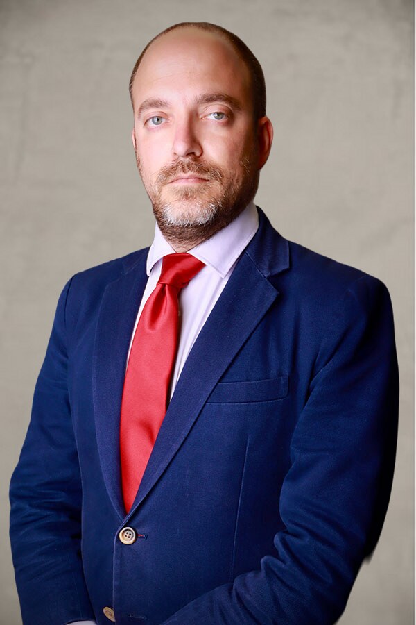 Eugene Zinovyev, Esq. - Junior Partner